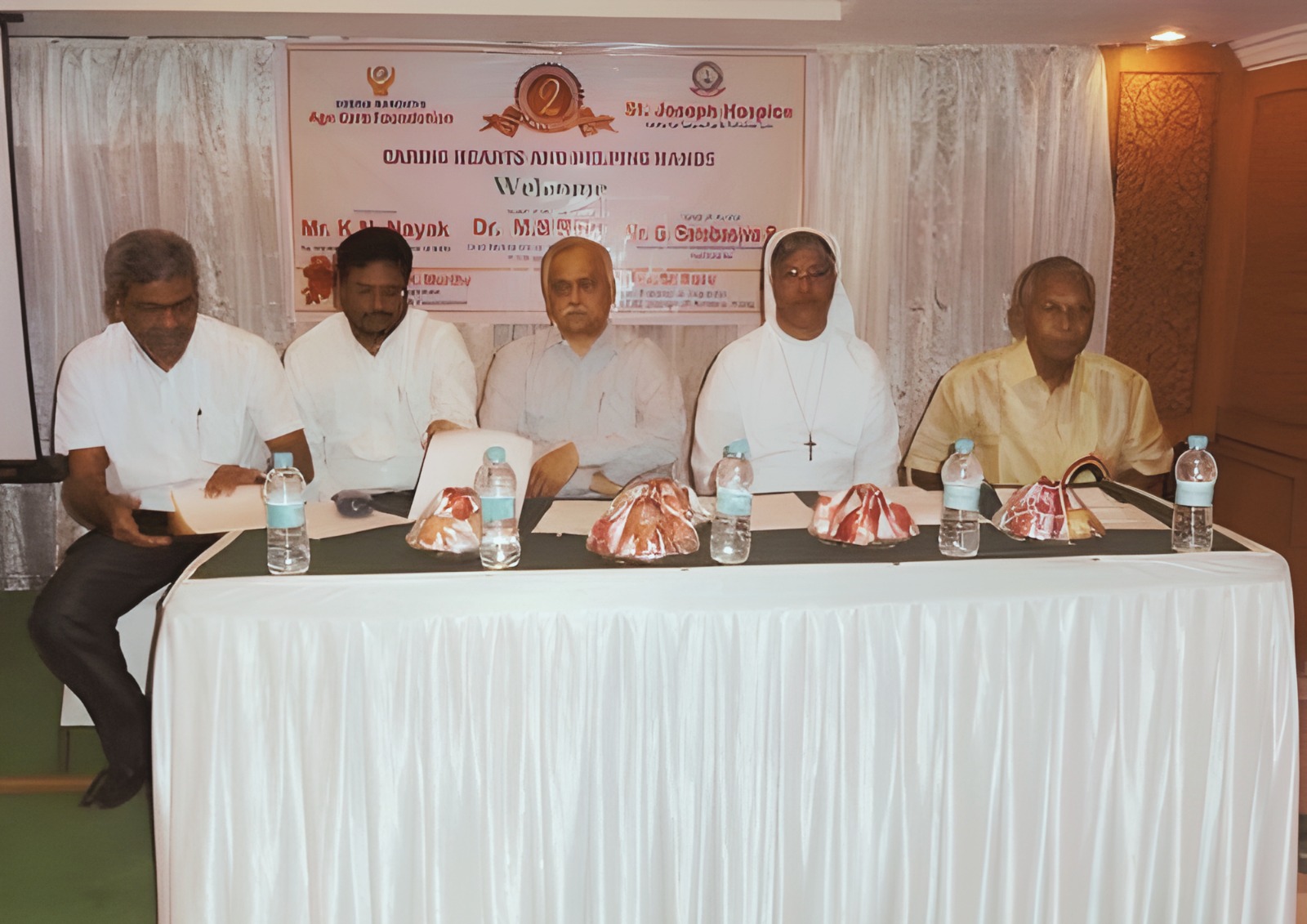 An elderly woman enjoying a peaceful moment outdoors.